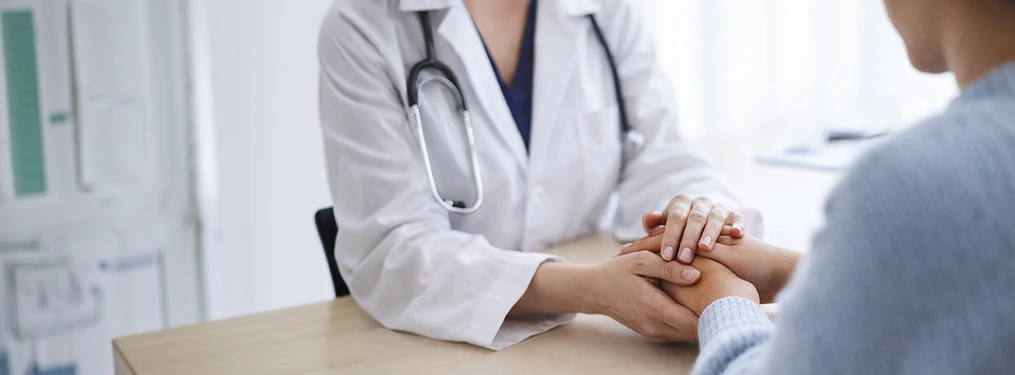 Doctor consulting with patient